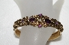 +MBA #E52-206   "Avon Antiqued Goldtone Purple Rhinestone Hinged Cuff Bracelet"