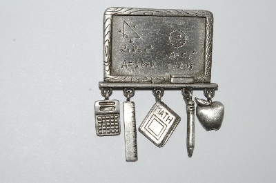 +MBA #E51-299   "JJ Jonette Jewelry Co. Silvertone Black Board Pin With Charms"