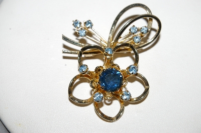 **MBA #E51-242   "Made In Austria Gold Plated Blue Crystal Rhinestone Flower Pin"
