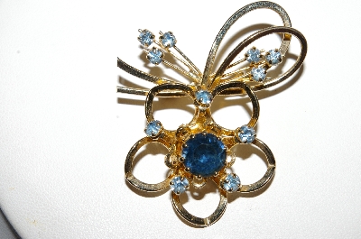 **MBA #E51-242   "Made In Austria Gold Plated Blue Crystal Rhinestone Flower Pin"