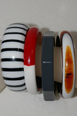 +MBA #E54-094   "Vintage Lot Of  "4" Plastic Bangle Bracelets"