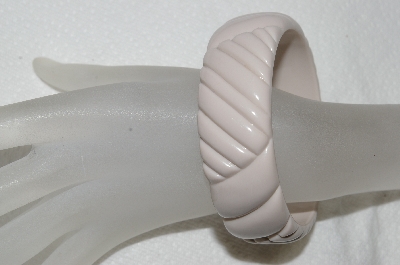 +MBA #E54-083   "Vintage Cream Colored Carved Plastic Bangle Bracelet" 