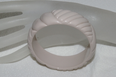+MBA #E54-083   "Vintage Cream Colored Carved Plastic Bangle Bracelet" 