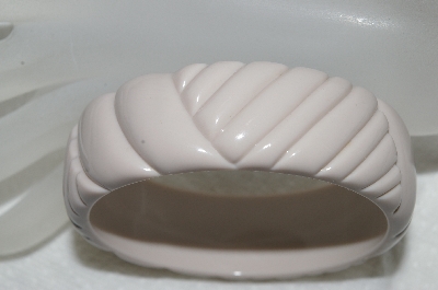 +MBA #E54-083   "Vintage Cream Colored Carved Plastic Bangle Bracelet" 