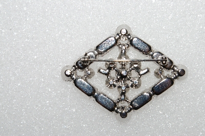 **MBA #E55-088   "Vintage Silvertone Fancy Shaped Clear Crystal Rhinestone Pin"