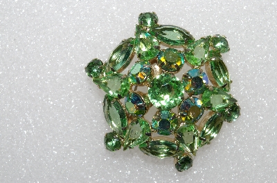 **MBA #E55-097   "Vintage Goldtone Fancy Green Glass & Crystal Rhinestone Brooch"