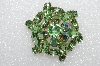 **MBA #E55-097   "Vintage Goldtone Fancy Green Glass & Crystal Rhinestone Brooch"
