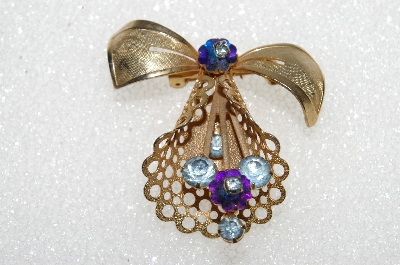 **MBA #E56-010   "1940's Bow Brooch With Marguerita Cut Two-Tone Stones"