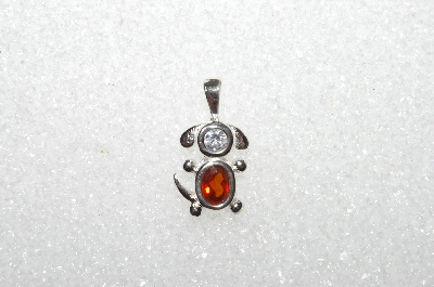 MBA #S51-109   "1980's Sterling January Dog Pendant"