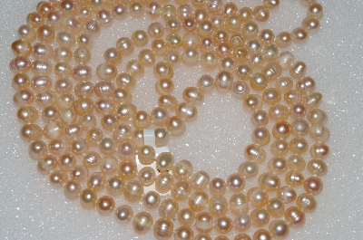 +MBA #S51-348   "64" Endless Peach Freshwater Pearl Necklace"