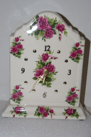 +MBA #S25-008   "Pink Rose Ceramic Mantel Clock"