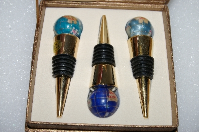 +MBA #S25-337   "Set Of 3 Blue Gemstone Globe Wine Stoppers"