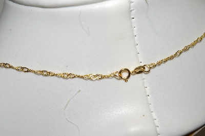+MBA #S25-362   "14K Yellow Gold Twisted 18" Chain"