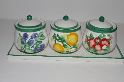 +MBA #S13-096   "2003 Set Of 3 Fruit Scented Candles In Hand Painted Ceramic Jars"