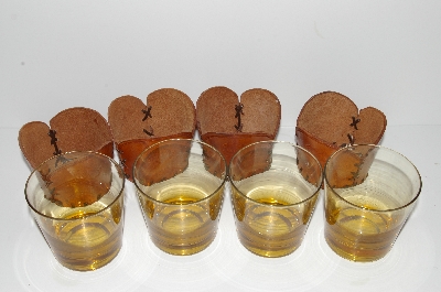 +MBA #S28- 233   "Set Of 4 Amber Glass Tumblers With Hand Tooled Leather Drink Holders"
