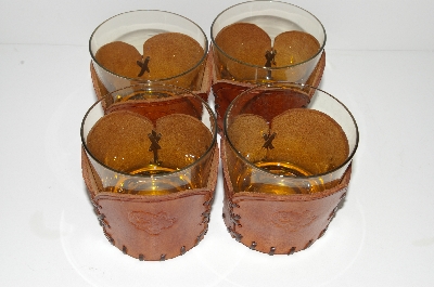 +MBA #S28- 233   "Set Of 4 Amber Glass Tumblers With Hand Tooled Leather Drink Holders"