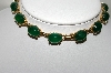 +MBA #88-007  "Vintage Gold Plated Fancy Green Cabochon Glass Chocker"