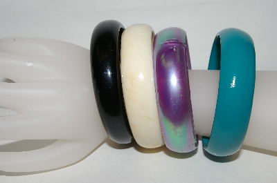 +MBA #88-008  "Set Of 4 Acrylic Bangle Bracelets"