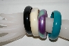 +MBA #88-008  "Set Of 4 Acrylic Bangle Bracelets"