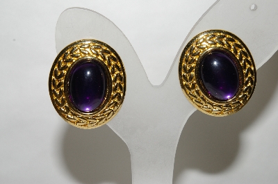 +MBA #88-076  "Trifari Purple Cabachon Clip On Earrings"