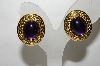 +MBA #88-076  "Trifari Purple Cabachon Clip On Earrings"