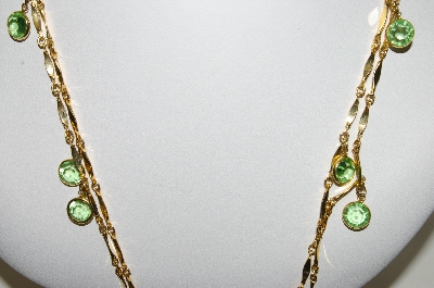 +MBA #89-045  "Gold Tone Green Glass Faceted Stone Necklace"