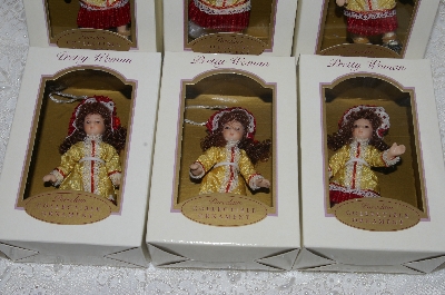 +MBA #SG9-032  "2004 Set Of 6 Gold & Red Collectible Porcelain Doll Ornaments"