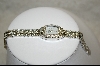 Nolan Miller's Silver Toned Pave Panther Link Watch