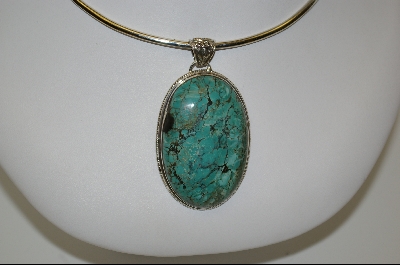+MBA #7599   Oval Shaped Blue Turquoise Pendant