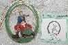 MBAB #29-027  "Norman Rockwell "Skating Lesson" Ornament"