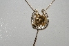 +MBAMG #25-189  "Goldtone Rhinestone Horseshoe Bolo Necklace"