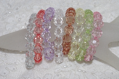 +MBAMG #11-0787  "Set Of 8 Light Faceted Acrylic Bead Stretch Bracelets"