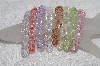 +MBAMG #11-0787  "Set Of 8 Light Faceted Acrylic Bead Stretch Bracelets"