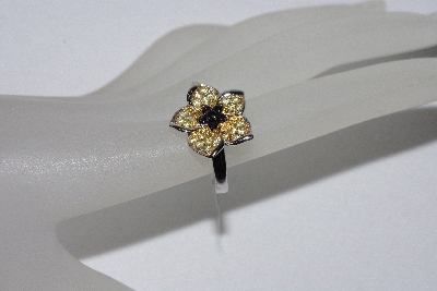+MBAMG #11-0826  "Charles Winston Flower Ring"
