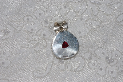 +MBAMG #11-0857  "L. Bennett Created Ruby Sterling Pendant"