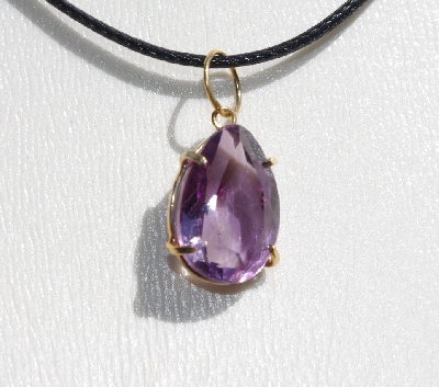 +MBA #5600-340  "Prong Set Fancy Pear Cut Amethyst Pendant With 18" Black Cord"