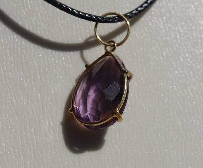 +MBA #5600-340  "Prong Set Fancy Pear Cut Amethyst Pendant With 18" Black Cord"