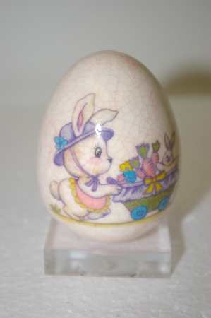 +MBA #11-195   1980's Porceline Cracked Finish Bunny On A Bike Egg