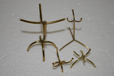 +MBA #12-256  Set Of 4 Brass Small Egg Holders