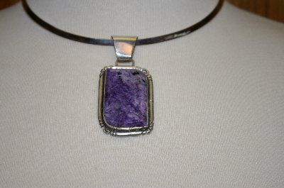 +MBA #16-182  Artist "E. Yazzie" Signed Charolite Sterling Pendant