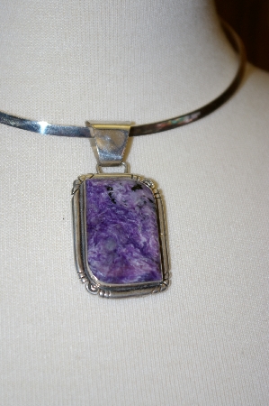 +MBA #16-182  Artist "E. Yazzie" Signed Charolite Sterling Pendant