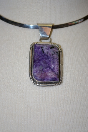 +MBA #16-182  Artist "E. Yazzie" Signed Charolite Sterling Pendant
