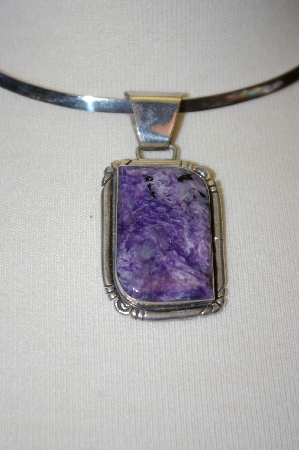+MBA #16-182  Artist "E. Yazzie" Signed Charolite Sterling Pendant