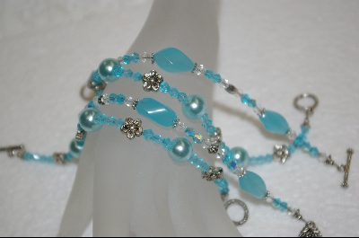 +  Set of 4 Hand Beaded Aqua Blue Bracelets