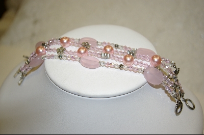 +  Set of 4 Pink Glass Bead Bracelets