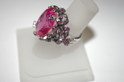 +MBA #23-584  Charles Winston Large Oval Created Pink Sapphire Ring