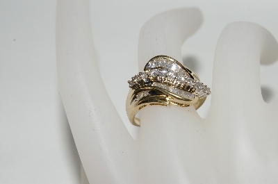 +MBA #77-059  14K Yellow Gold Round & Baguette Cut Diamond Ring