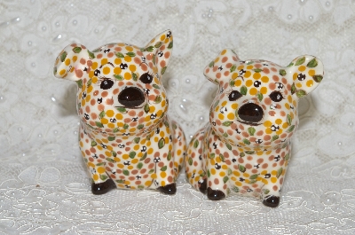 +MBADG #31-063  "1986 Hand Painted Floral Motif Pig Salt & Pepper Shakers"