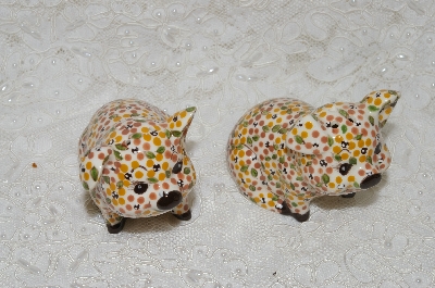 +MBADG #31-063  "1986 Hand Painted Floral Motif Pig Salt & Pepper Shakers"