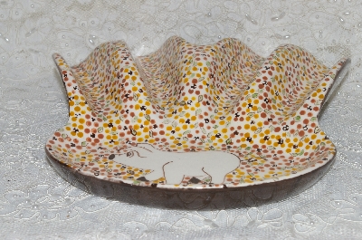 +MBADG #31-011  "1986 Hand Painted Floral & Pig Motif Spoon Rest"